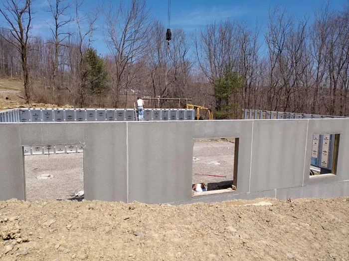 Superior Walls precast concrete foundation panels being installed
